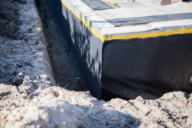 Professional Waterproofing technician working in Westfield, IN